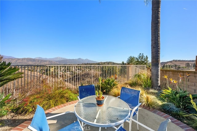 view of patio with a mountain view