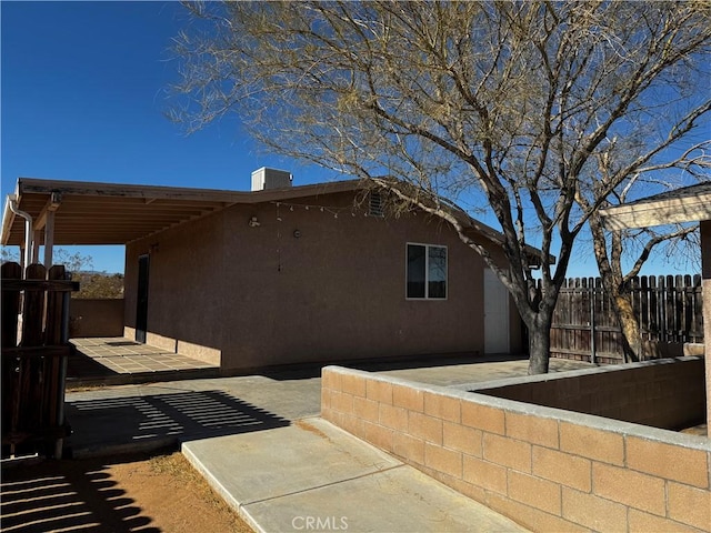 view of home's exterior featuring a patio