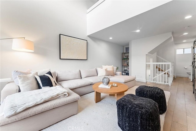 living room with light hardwood / wood-style flooring