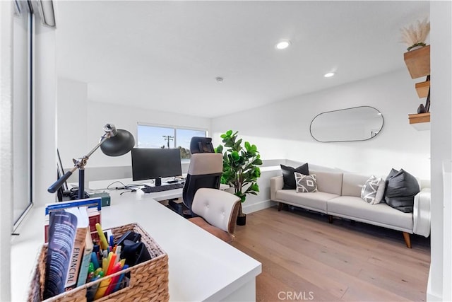 home office with light wood-type flooring