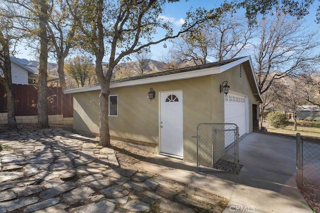 exterior space with a garage