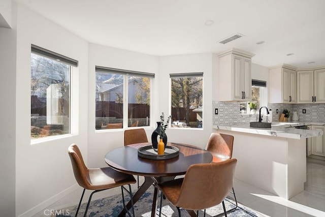 dining area featuring sink