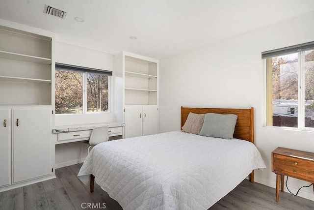6124 Juniper Rd, Lake Isabella, CA 93240 - bedroom featuring wood finished floors, multiple windows, and baseboards