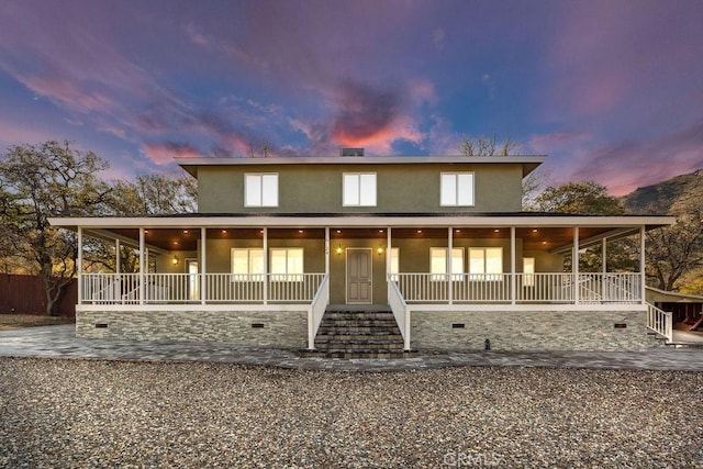6124 Juniper Rd, Lake Isabella, CA 93240 - farmhouse-style home featuring stucco siding and stairs