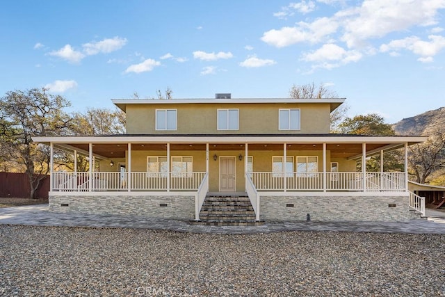 country-style home with covered porch