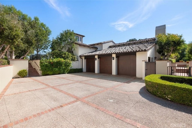 view of side of property with a garage