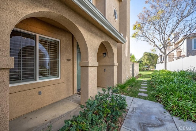 doorway to property with a patio