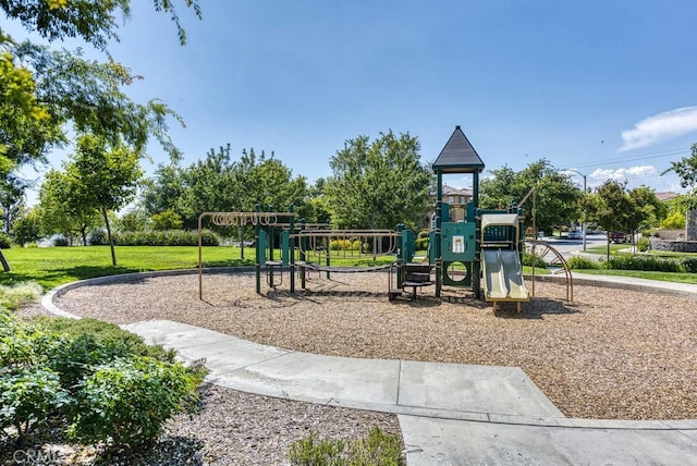 view of play area featuring a lawn