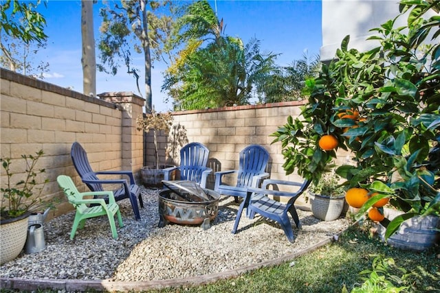 view of patio / terrace featuring a fire pit