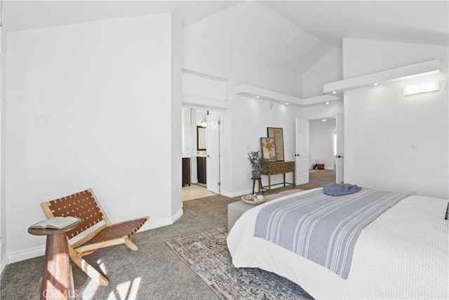 bedroom with high vaulted ceiling and carpet flooring