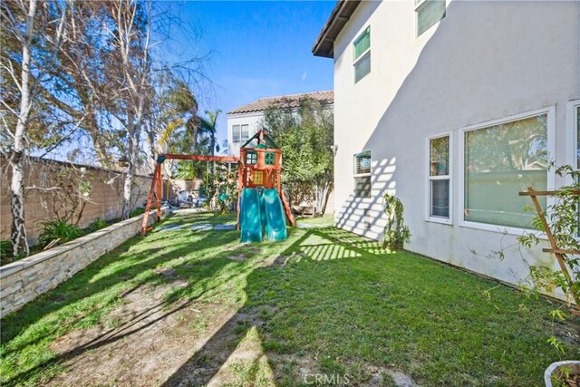 view of yard featuring a playground