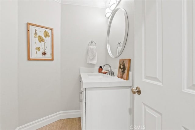 bathroom with wood-type flooring and vanity