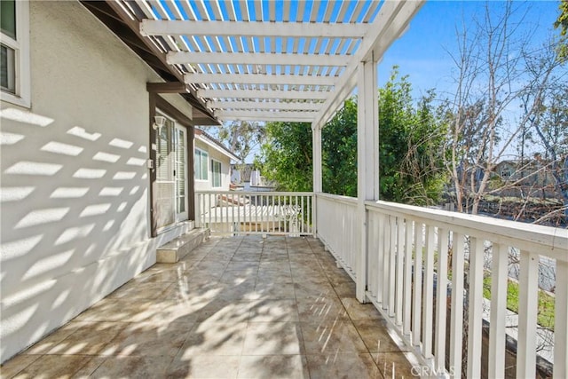 view of patio featuring a pergola