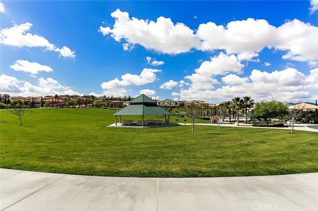 view of community with a gazebo and a yard