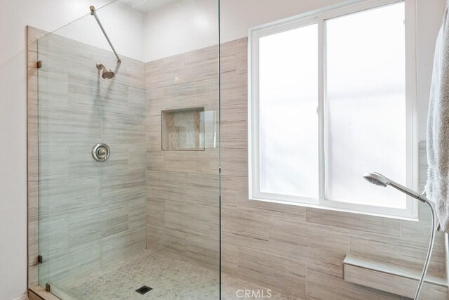 bathroom featuring walk in shower