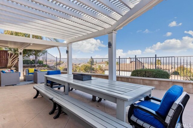 view of patio with a pergola and outdoor lounge area