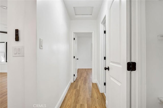 hallway featuring light hardwood / wood-style flooring