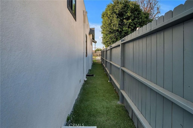 view of home's exterior featuring a lawn