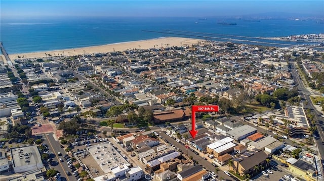 aerial view featuring a beach view and a water view