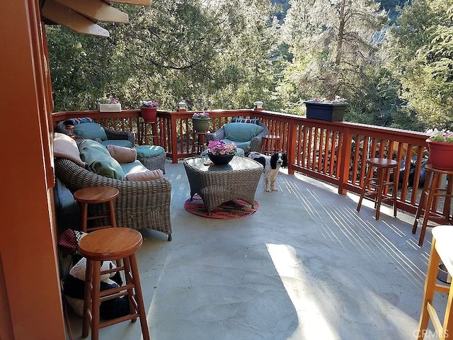 deck featuring an outdoor living space