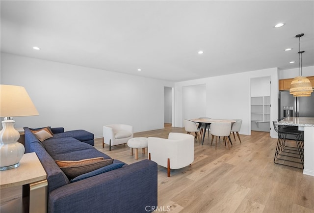 living room with light hardwood / wood-style floors