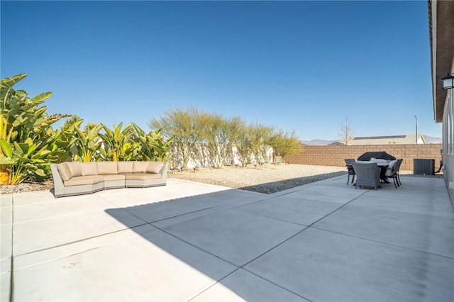 view of patio with central AC unit