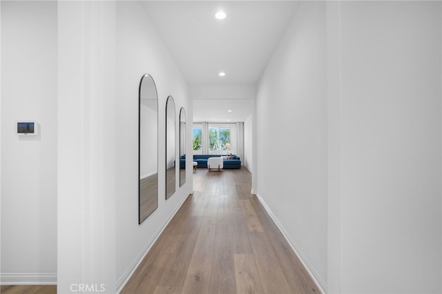 corridor featuring light hardwood / wood-style flooring