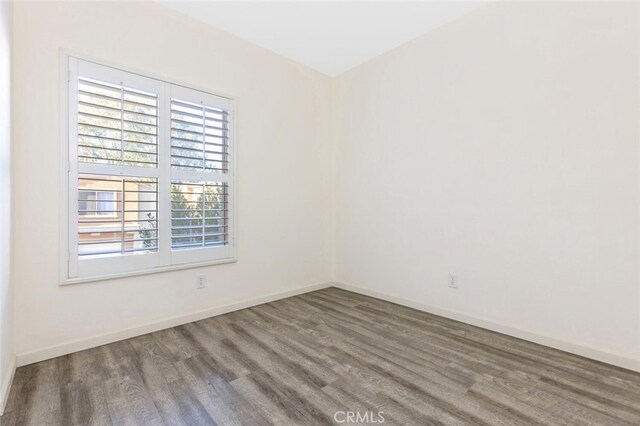 empty room featuring hardwood / wood-style floors