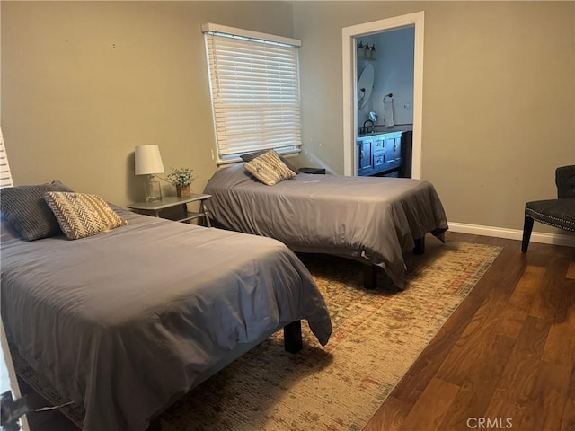 bedroom featuring dark wood-type flooring