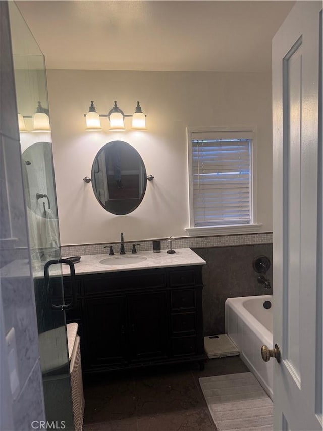 bathroom featuring a bathtub and vanity