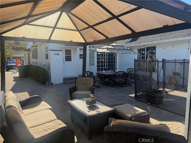 view of patio / terrace with outdoor lounge area and a gazebo