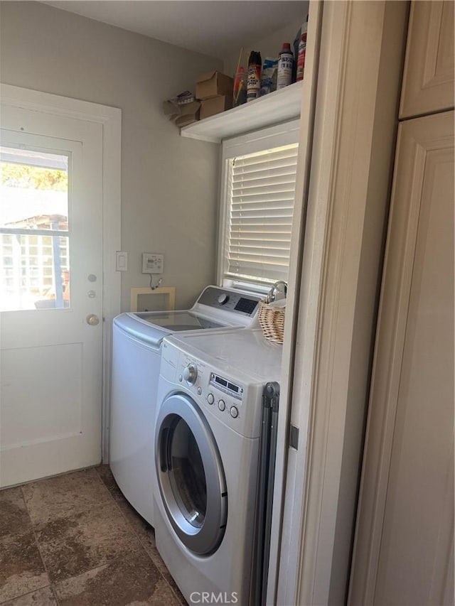 laundry area featuring washer and clothes dryer