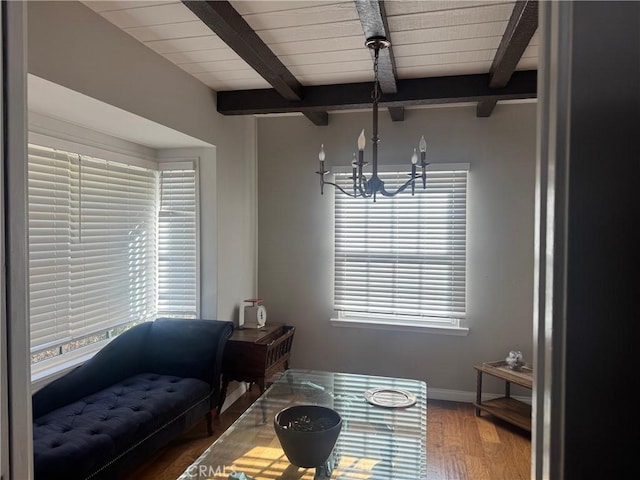 interior space featuring beamed ceiling, a chandelier, and hardwood / wood-style flooring