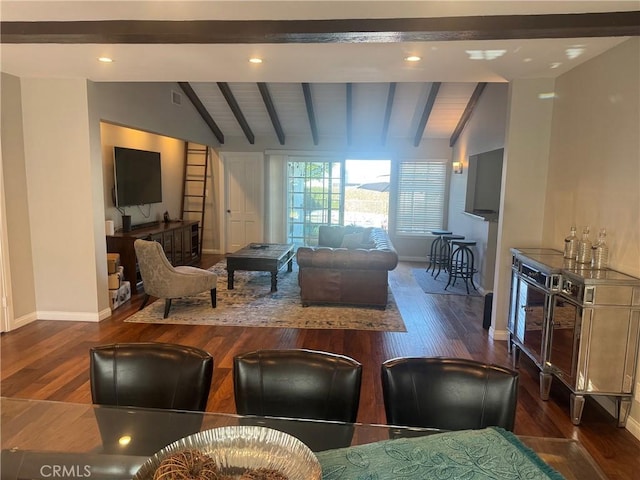 living room featuring vaulted ceiling with beams and hardwood / wood-style flooring