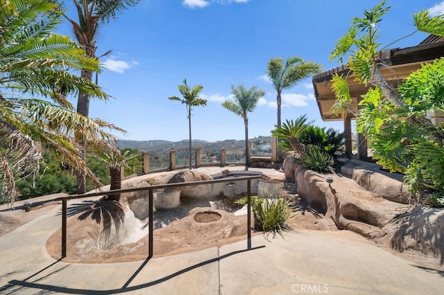 view of patio with a mountain view