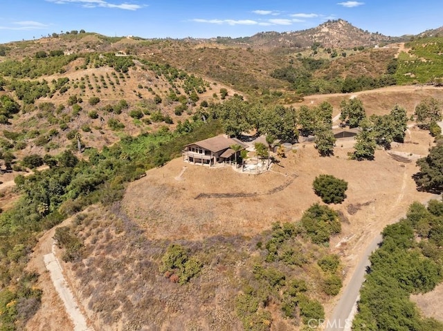 drone / aerial view featuring a mountain view