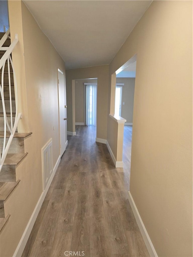 hall featuring wood-type flooring