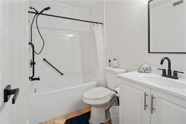 full bathroom featuring toilet, vanity, and shower / bath combo