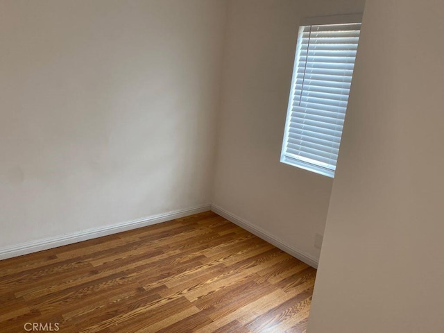 unfurnished room featuring light wood-type flooring