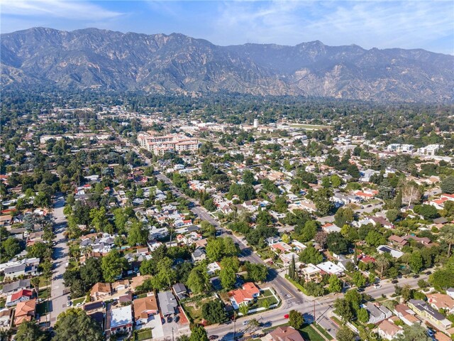 drone / aerial view featuring a mountain view