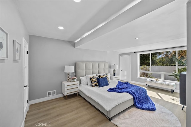 bedroom with light hardwood / wood-style floors