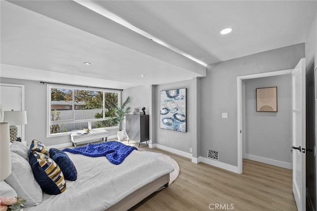 bedroom featuring light wood-type flooring