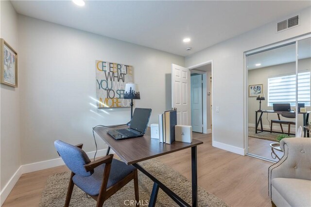 office space featuring light hardwood / wood-style flooring