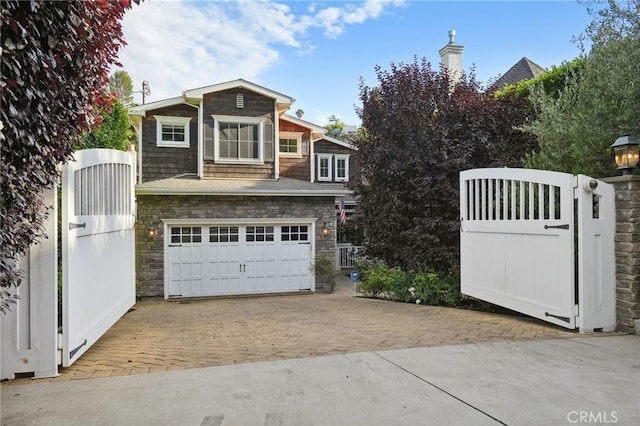 view of front of property featuring a garage