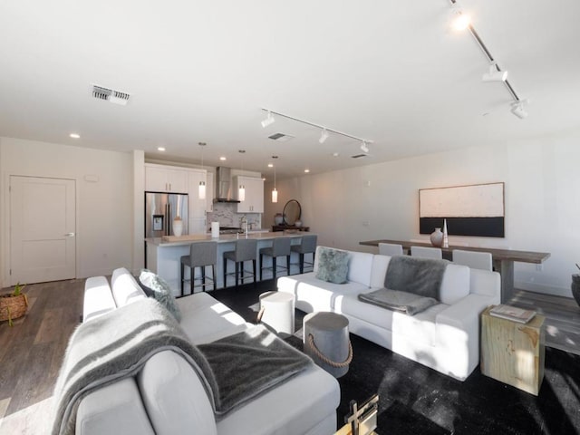 living room featuring dark hardwood / wood-style flooring