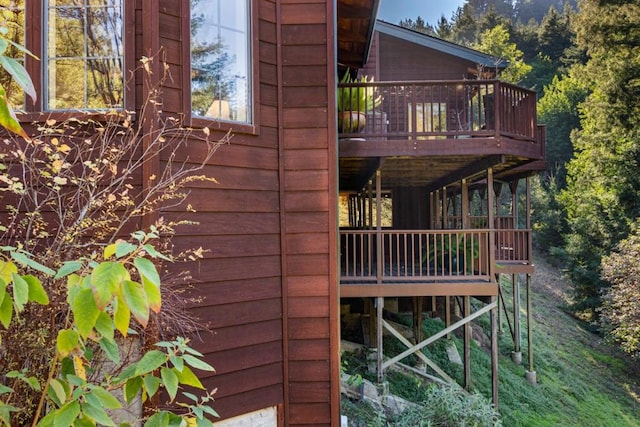 view of side of home featuring a deck