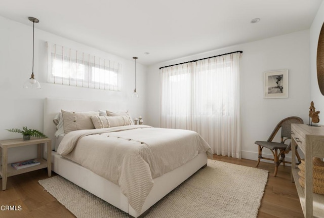 bedroom featuring wood-type flooring