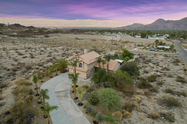 aerial view at dusk with a mountain view