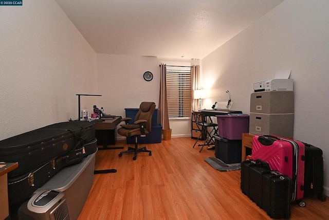 home office with light wood-type flooring