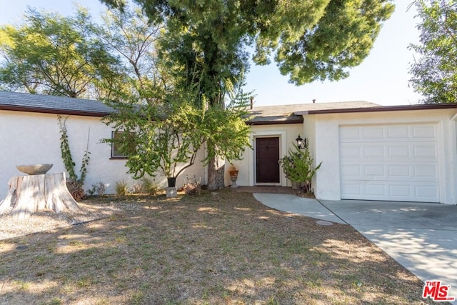 ranch-style house with a garage